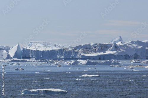 Giant Icebergs of Illulisat, Greenland, floating on water, a popular cruise destination