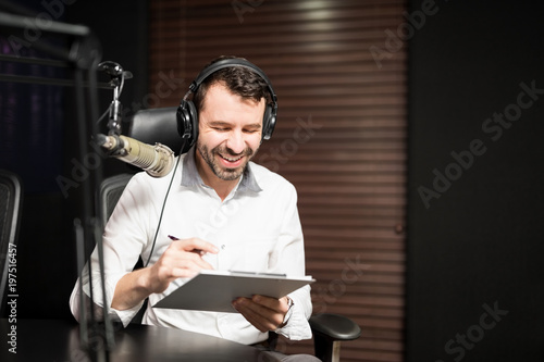 Photography Radio jockey interviewing a guest from studio