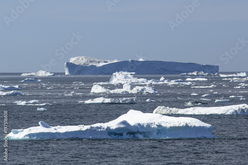 Giant Icebergs of Illulisat, Greenland, floating on water, a popular cruise destination