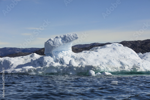 Giant Icebergs of Illulisat, Greenland, floating on water, a popular cruise destination