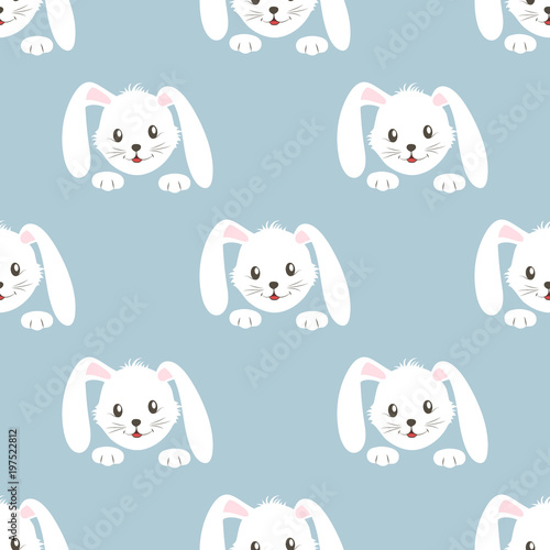 Seamless pattern with muzzle cute rabbit on blue background.