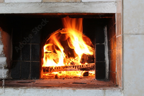 Hot beautiful fire in the Russian stove fireplace.