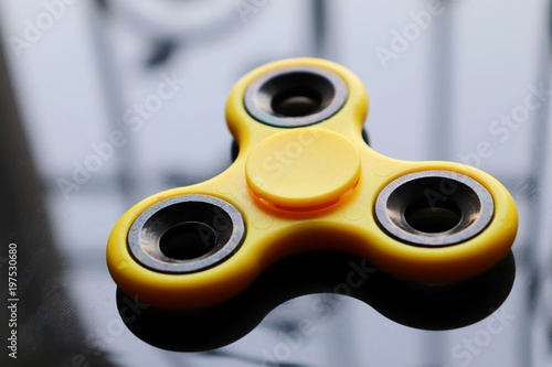 a beautiful yellow fidget spinner