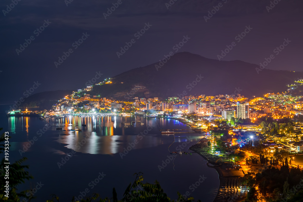 A picturesque panorama of the night city from the top of the mountain.