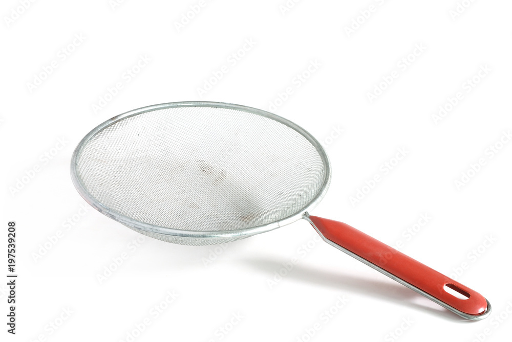 Colander with red handle on white background. Colander with red handle on white background.