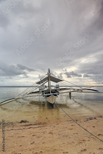 Balangay or bangka boat stranded on the beach. Punta Ballo-Sipalay-Philippines. 0342