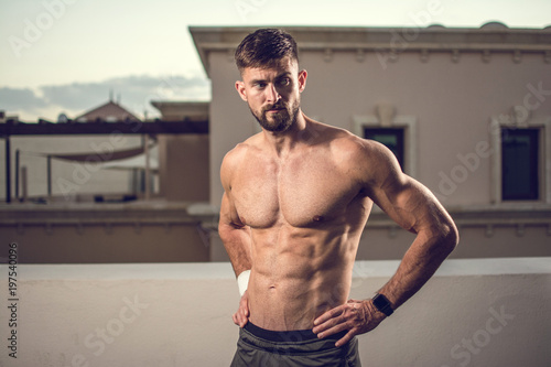 Sexy athletic muscular man with six-pack abs outdoors фототапет