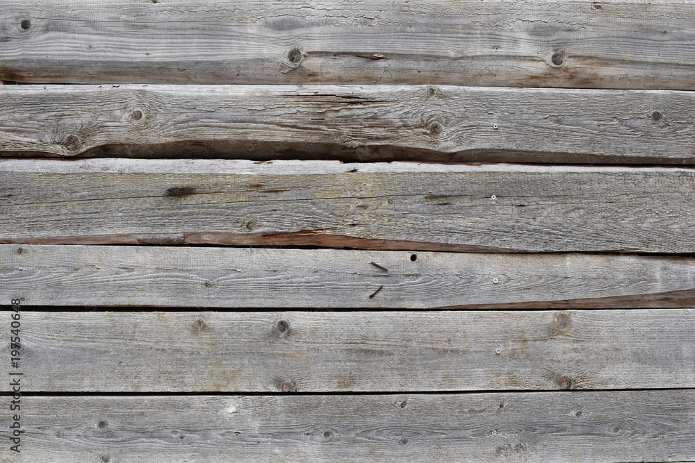 Natural textured background of grey aged wooden planks. Natural textured background of grey aged wooden planks.