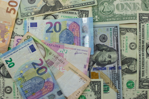American dollar banknotes and Euro. Background with money