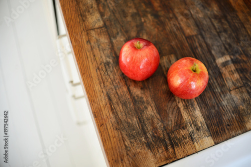 Apples on the kitchen counter.