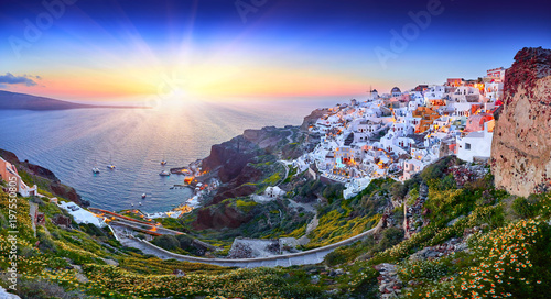 Church of Santorini. Fira town on Santorini island, Greece. Incredibly romantic sunset on Santorini. Oia village in the morning light. Amazing sunset view with white houses. Island lovers