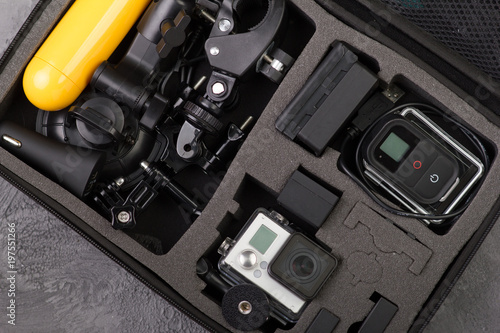 Top view Action camera with accessories in a bag