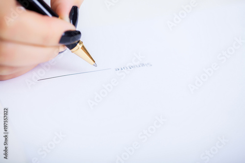 Business woman is signing a contract, business contract details