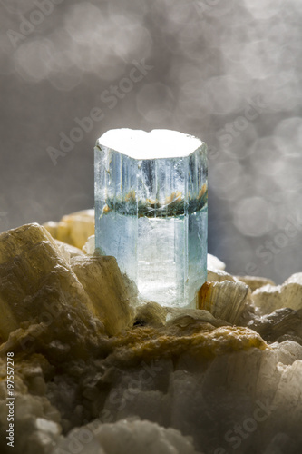 Fotografija Close-up shot of an aquamarine crystal on dark background