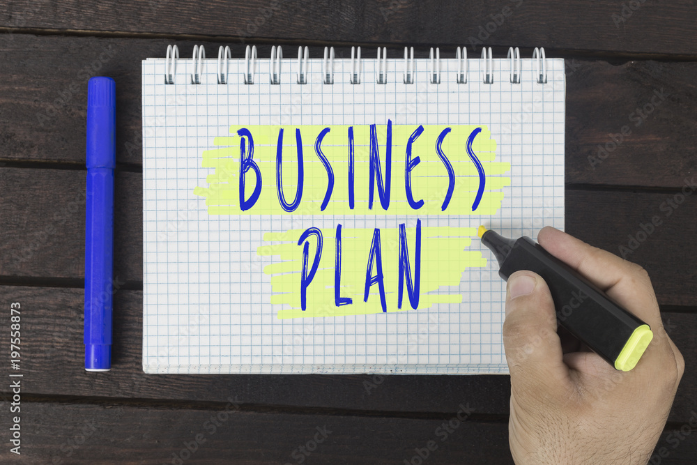 hand writing on notepad: Business plan hand writing on notepad: Business plan