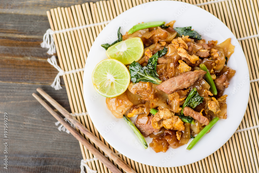 Thai food, stir fried rice noodles in soy sauce (Pad See Ee) Thai food, stir fried rice noodles in soy sauce (Pad See Ee)