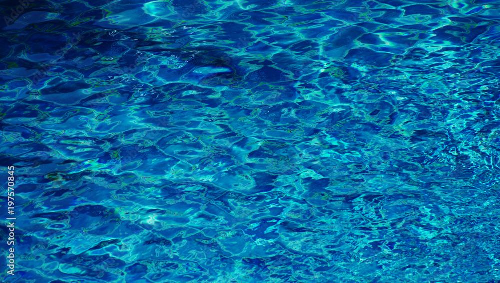 Pool water as background / Water is a transparent, tasteless, odorless, and nearly colorless chemical substance that is the main constituent of Earth's streams, lakes, and oceans, and the fluids of mo