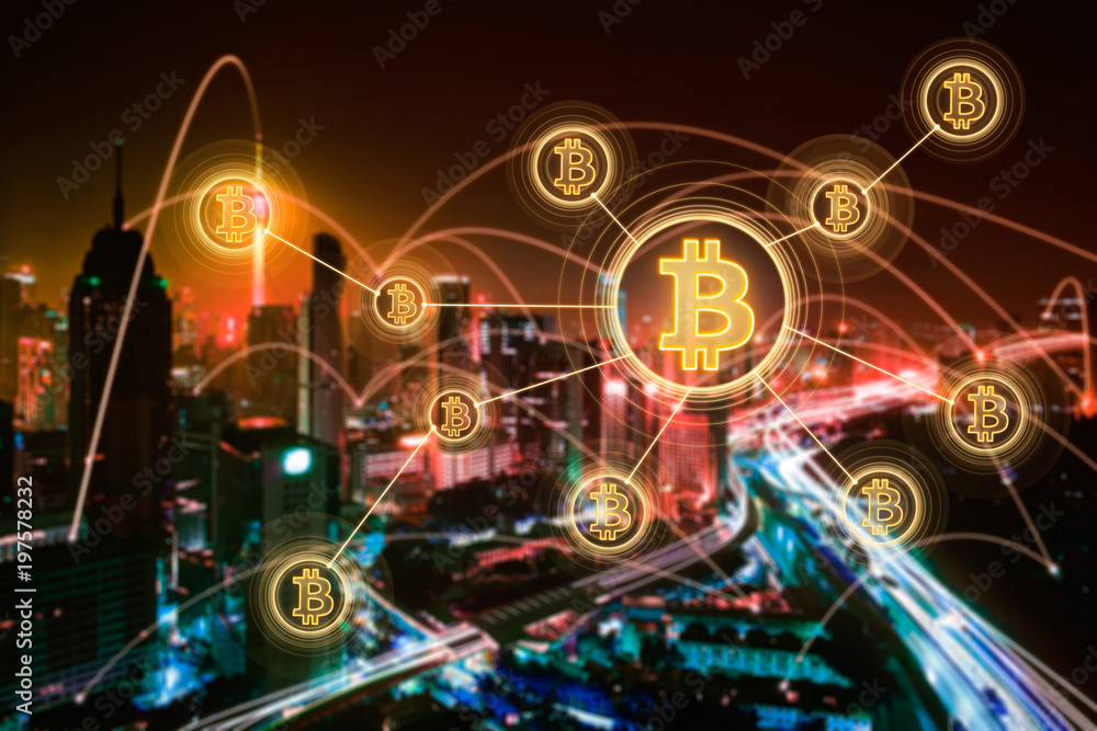Bitcoins and blockchain network connection with blur night city background .Electronic money ,blockchain transfers and finance concept.