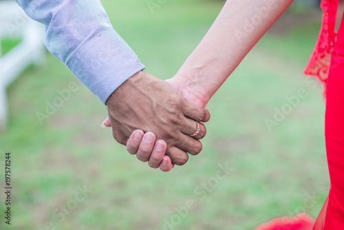 hands of couple