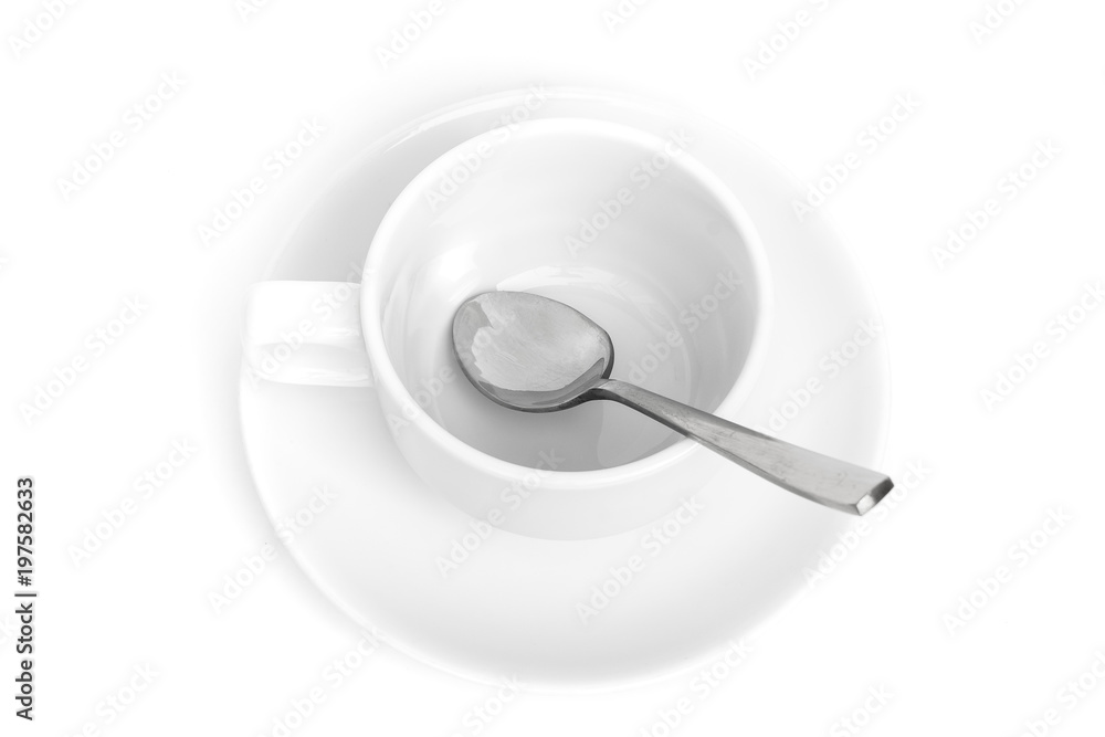 empty ceramic cup with teaspoon on white background. top view empty ceramic cup with teaspoon on white background. top view