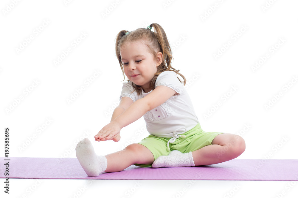 Kid girl doing fitness exercises isolated on white Kid girl doing fitness exercises isolated on white