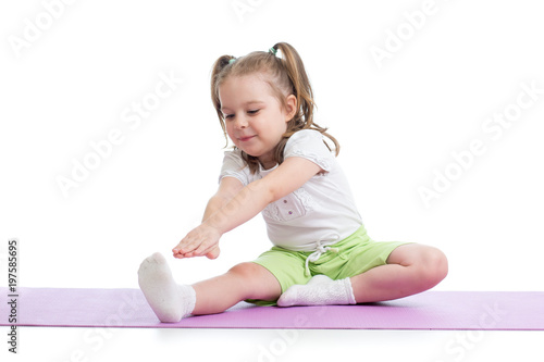 Kid girl doing fitness exer...