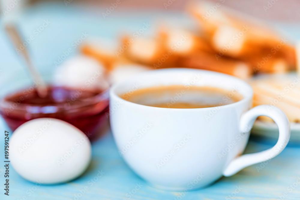 Breakfast with coffee, eggs, toasts, cheese, jam Breakfast with coffee, eggs, toasts, cheese, jam