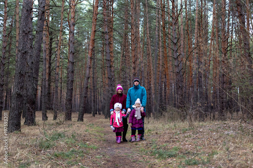 Rural family in autumn forest