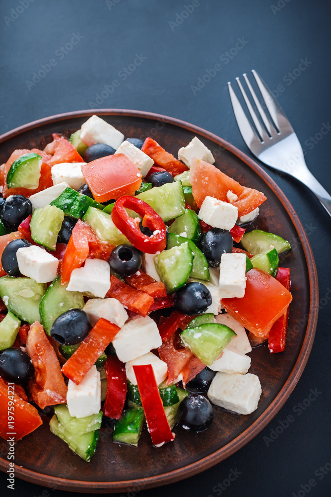 Greek salad with tomatoes, feta and olives