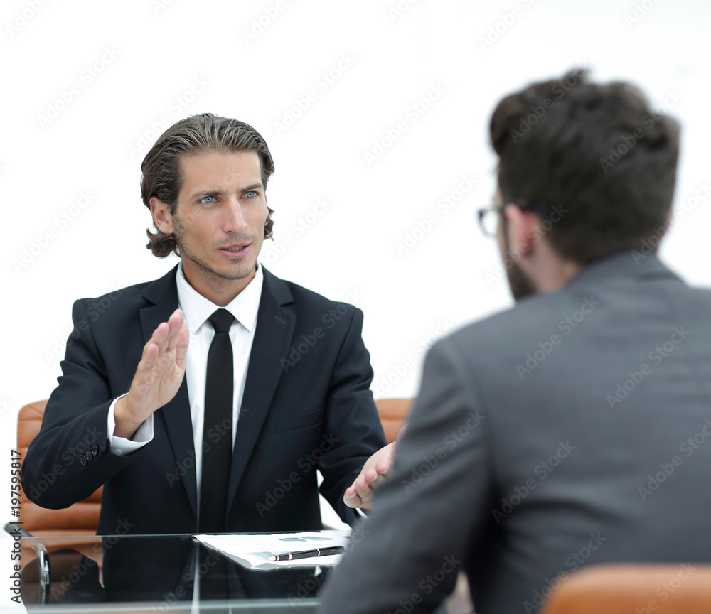 business partners discussing issues sitting business partners discussing issues sitting
