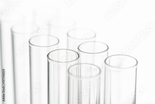 Laboratory Microscope, pills and test tubes. Scientific and healthcare research background.