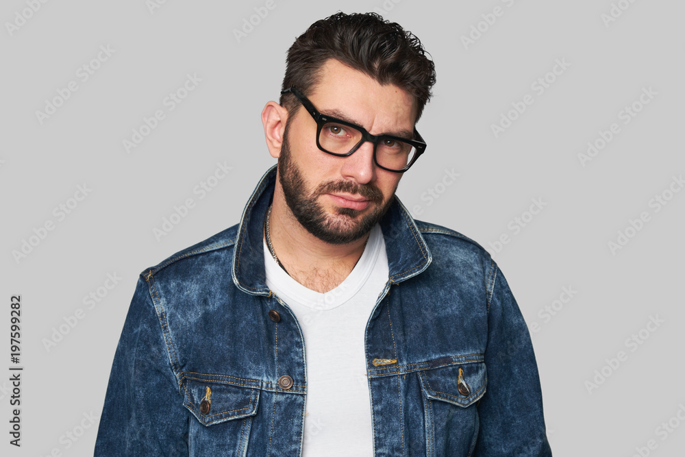 Fototapeta premium Casual man wears denim jacket and glasses