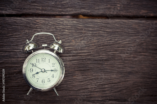 Restro alarm clock on old wood tabel