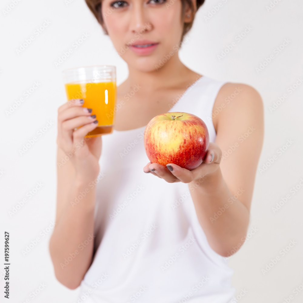 Beautifulyoung Asia woman with healthy food. Isolated on white background. Studio lighting. Concept for healthy. Beautifulyoung Asia woman with healthy food. Isolated on white background. Studio lighting. Concept for healthy.