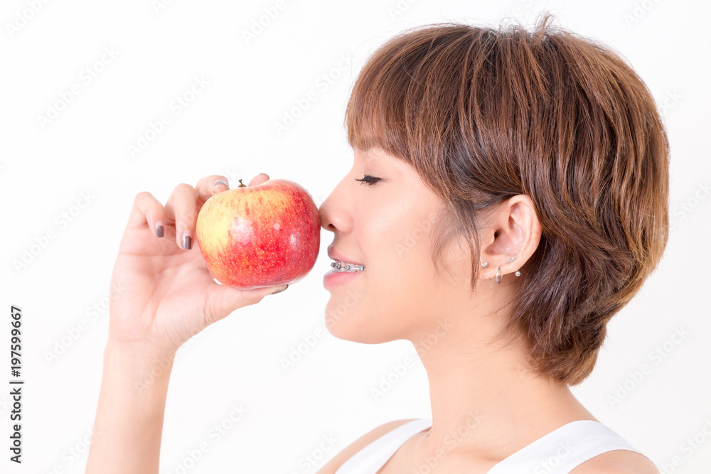 Beautifulyoung Asia woman with healthy food. Isolated on white background. Studio lighting. Concept for healthy. Beautifulyoung Asia woman with healthy food. Isolated on white background. Studio lighting. Concept for healthy.