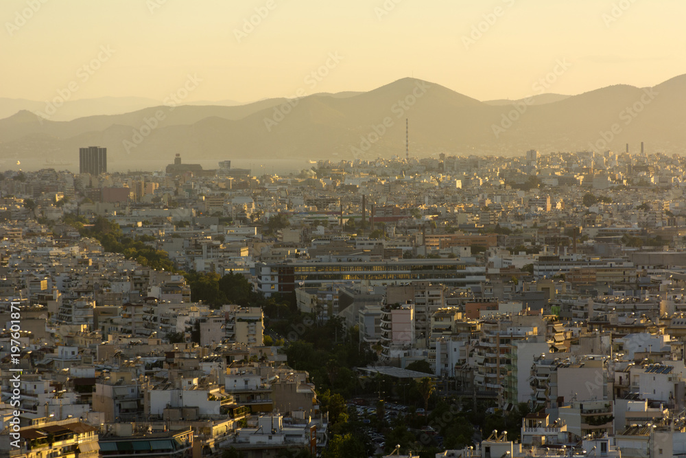 view of Athens at sunset in the haze, buildings, Greece ,city landscape