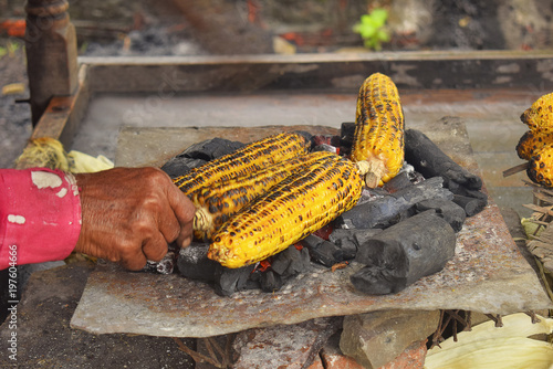 Corn being roasted on coal, Pune, Maharashtra. photo