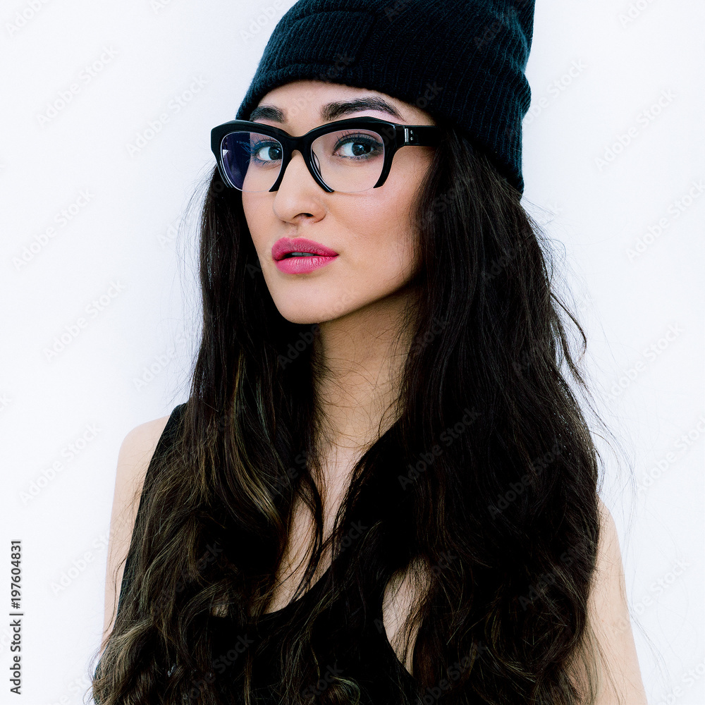  Brunette Girl in stylish glasses and beanie cap