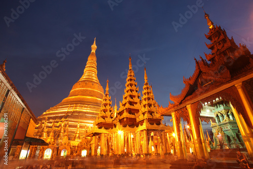 Long exposure of the golden buddhist pagoda or stupa of Shwedagon Pagoda at twilight, Yangon, Myanmar.