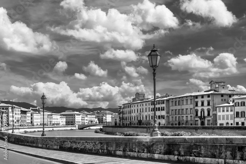 Black and white view of the beautiful sky over the historic center of Pisa, Tuscany, Italy © Marco Taliani