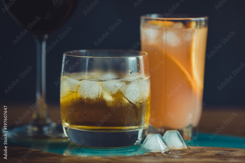 Alcohol drinks on dark solid background Alcohol drinks on dark solid background