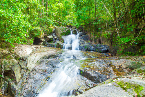 Tropical waterfall in the forest Ton Chong Fa  in khao lak Phangnga South of Thailand