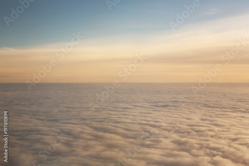 Sunset above the clouds with copy space © rangizzz