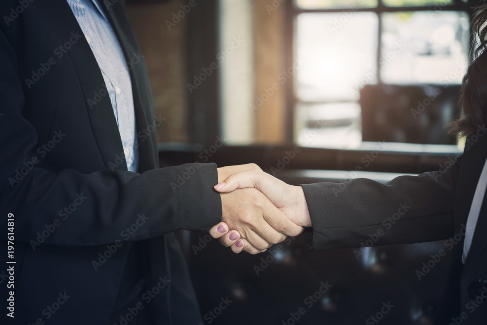 Success concept in business concept. Business peoples handshake after successful deal. Partnership. Picture for add text message. Backdrop for design art work.