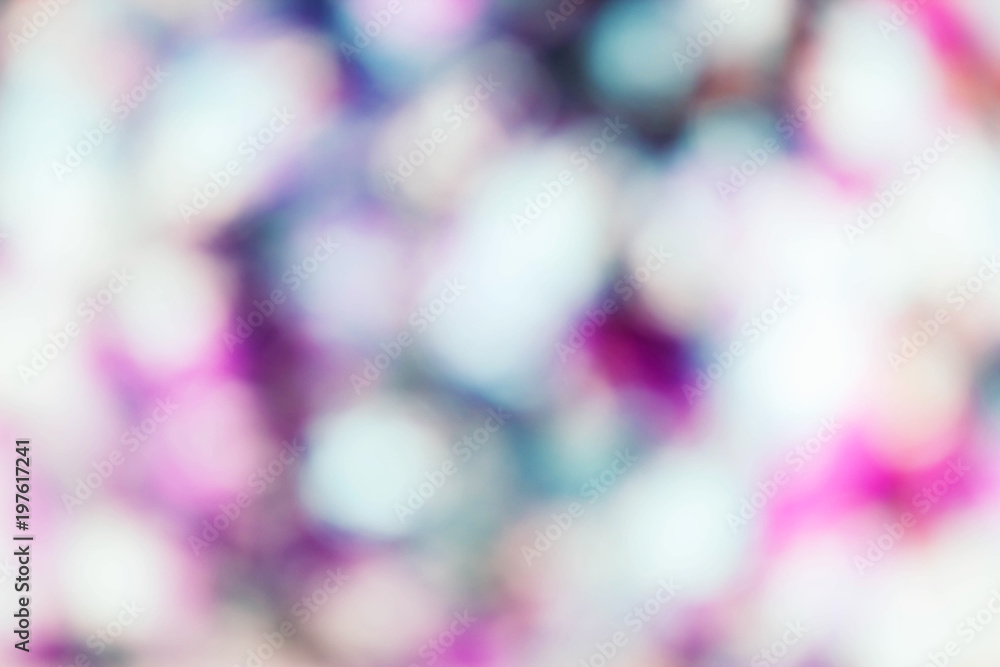 Multicolored glitter abstract bokeh background