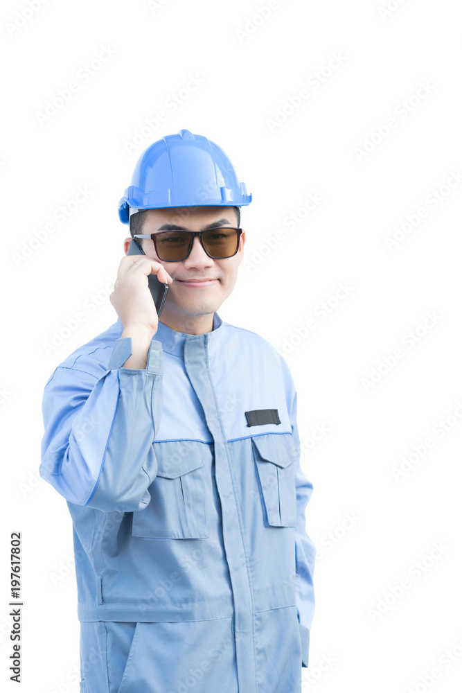 Portrait of an handsome engineer used mobile phone on white background. Portrait of an handsome engineer used mobile phone on white background.