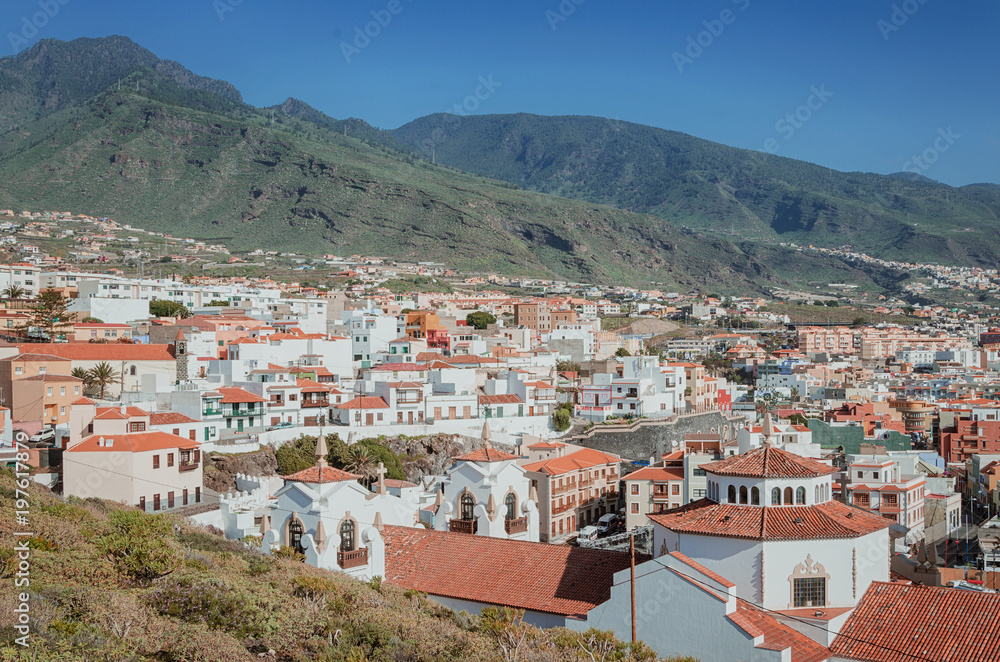 White houses with red roof in Villa Mariana de Candelaria, in the eastern part of the island of Tenerife. Beautiful landscape , Canary island, Spain.