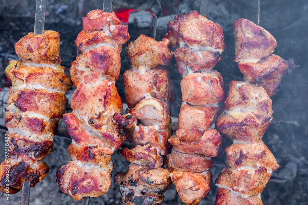 closeup of grilled meat on bbq outdoors