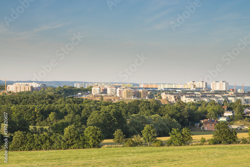 Canvas Print Block of flats situated in green nature