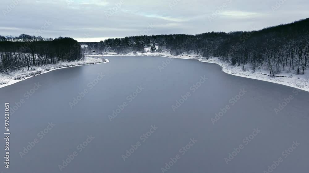 River in winter. Snowy winter. Winter shooting from the drone. River in winter. Snowy winter. Winter shooting from the drone.